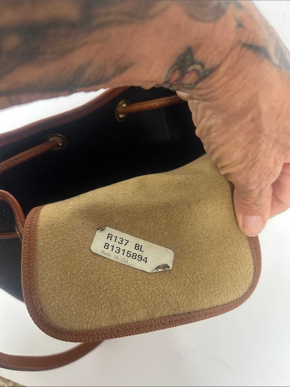 Dooney & Bourke Black Pebbled Leather Drawstring Bucket Bag with Tan Trim - Picture 12 of 13